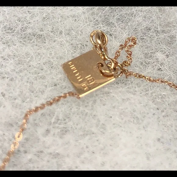 GINETTE NY
Angele 18K Rose Gold 3 Mini Heart Charms 17” Necklace - Picture 10 of 15